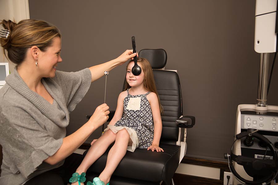 Woman using a modern eye machine