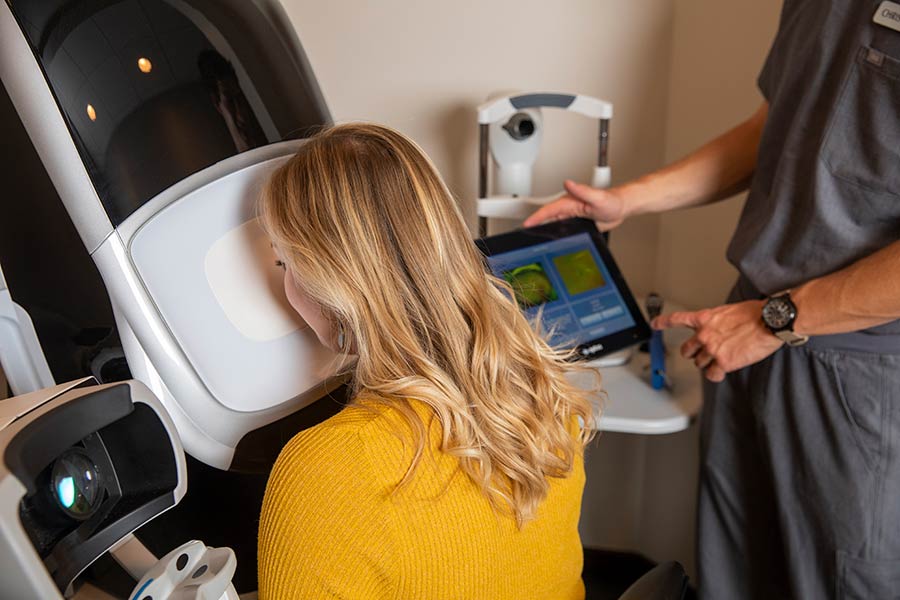 Woman using a modern eye machine