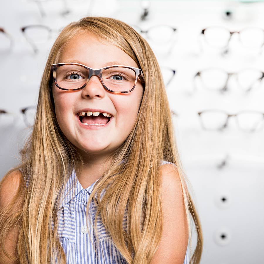 Girl smiling wearing glasses